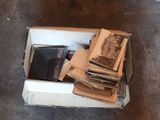 a box full of old photos and old books