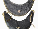 pair of black leather and brass - plated banana shaped purses