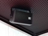 an image of a speaker on the ceiling of a room