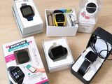 a box with a watch and a cell phone in it