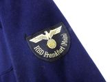 blue jacket with a gold eagle on the back of it