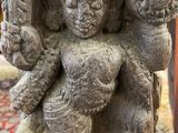 an image of a statue of a woman holding a baby