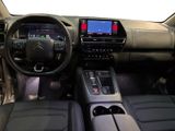 a picture of the interior of a car with a touch screen