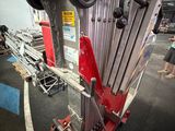 a large machine that is sitting in a garage