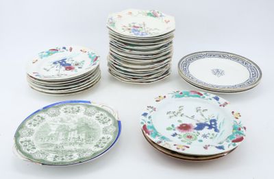 a lot of plates that are sitting on a table