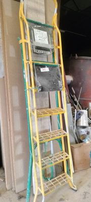 a ladder that is leaning against a wall
