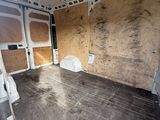 an image of a van that has been vandalized and is in need of repair
