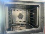 an image of an open oven with the door open