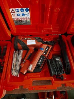 a red tool box with a bunch of tools inside of it