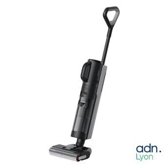 une photo en noir et blanc d'un aspirateur sans fil