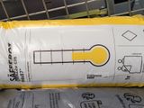 a bag of toilet paper sitting on top of a shopping cart