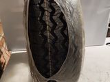 a tire that has been wrapped in plastic on a table
