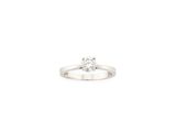 a close up of a diamond ring on a white background