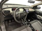 the interior of a car with a steering wheel and dashboard