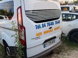 a white van that is parked in the grass