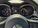 the dashboard of a car with a steering wheel and gauges