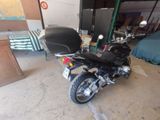 a motorcycle that is parked in a garage