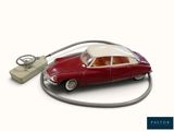 a toy car that is connected to a computer mouse