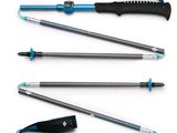 four different types of ski poles are lined up on a white surface