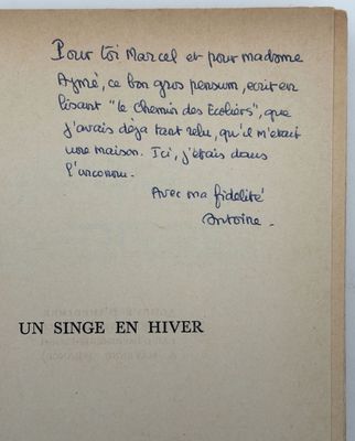 an old book with a poem written in french on it