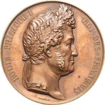 une image montrant un gros plan d'une médaille sur fond blanc