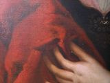 a painting of a woman in a red dress holding a cat