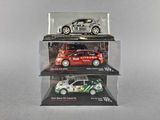 three different models of cars in a display case
