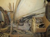 a pile of wires and other items in a room