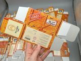 a person holding a box with a bunch of cards inside of it
