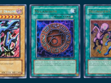 three different cards of different colors and designs on a blue background
