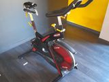 a stationary exercise bike in the corner of a room