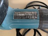 an image of a close up of a corded electric tool