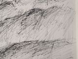 a black and white drawing on a white wall