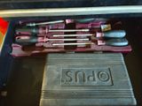 a tool kit that is sitting in a tool box