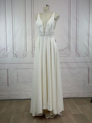 the back of a white dress on a mannequin mannequin mannequin mannequin mannequin mannequin mannequin mannequin