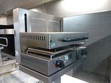 an image of a commercial kitchen with stainless steel appliances