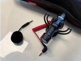 an image of a case with a flashlight and other items