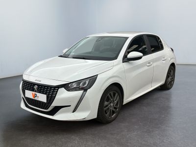 a white car parked in a white room with a black floor