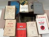 many books that are stacked on top of each other