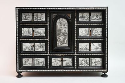 une commode en noir et blanc décorée de dessins
