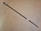 an image of a golf club handle on the floor