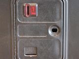 an image of a close up of a button on a train