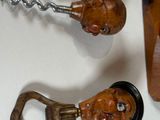 a bottle opener and a bottle opener with a face on it