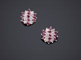 une paire de boucles d'oreilles en rubis et diamants