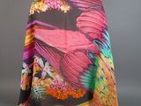 a multicolored silk shawl with a bird design on it