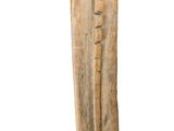 wooden sculpture of a man with a hat on his head