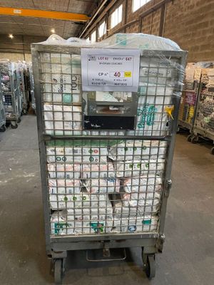 a cart with a lot of items on it in a warehouse