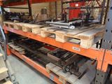 a lot of wooden pallets on the shelves in the warehouse