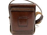 brown leather cross body bag on a white background