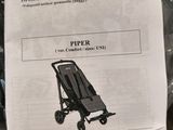 the instructions for the baby stroller are on the table